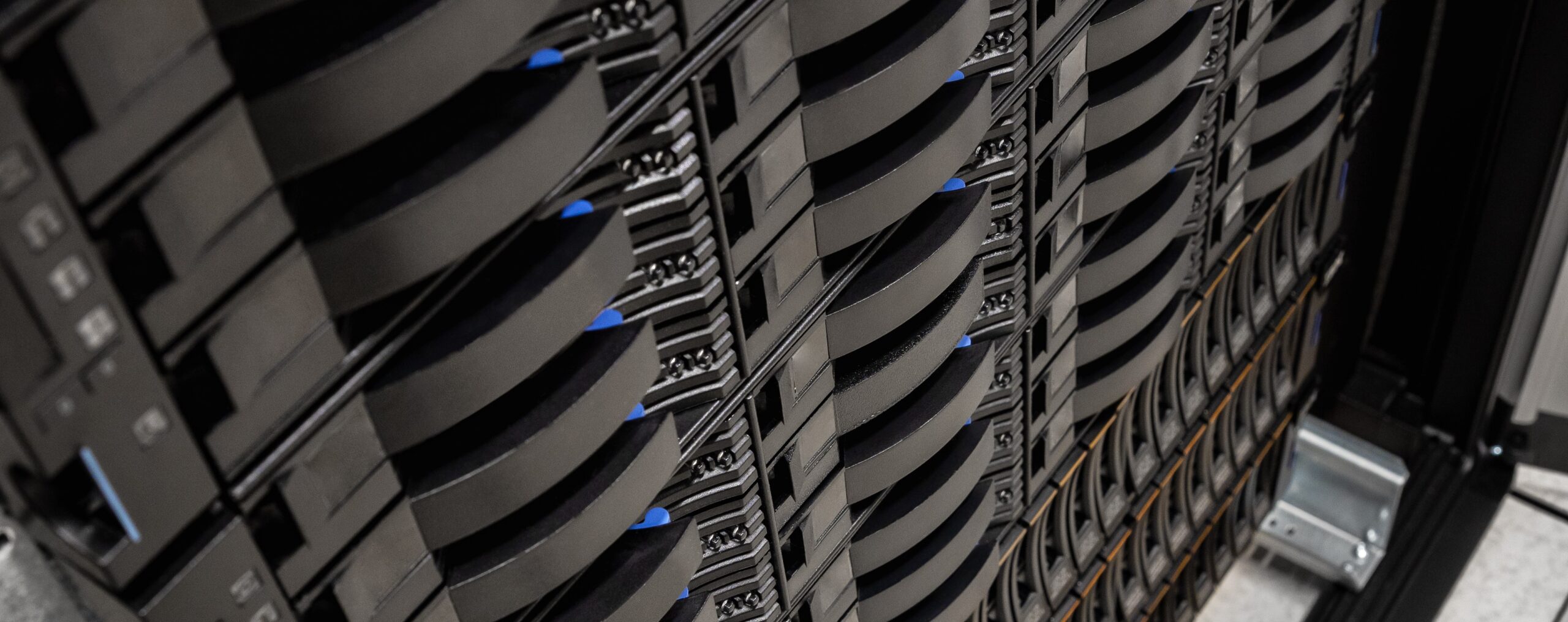 Closeup of SAN hard drive disk cabinet in rack at datacenter